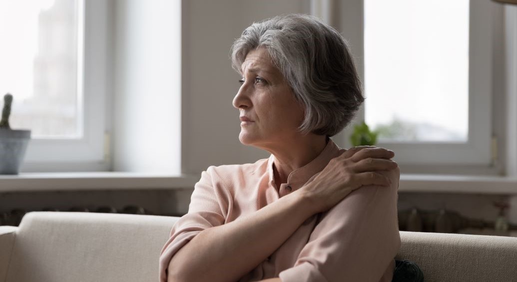 implications of loneliness older woman isolated at home